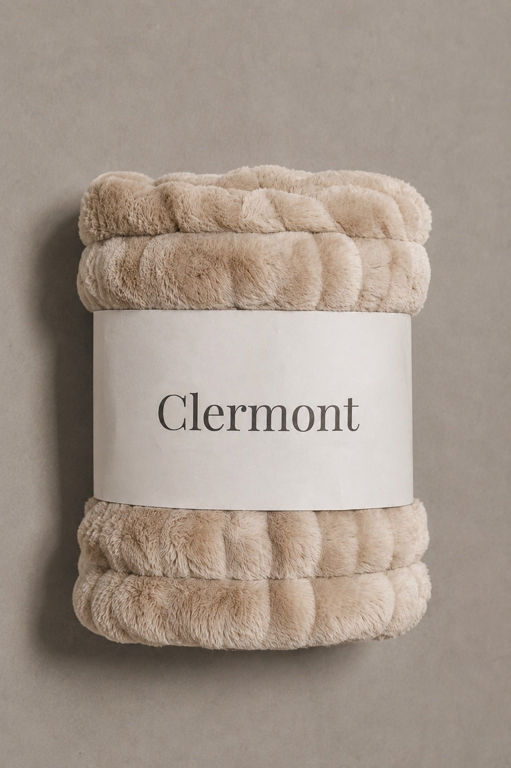 Clermont Signature Blanket, rolled and packaged with brand wrap